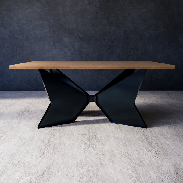 Aquila dining table with wooden top and black metal legs against a grey wall
