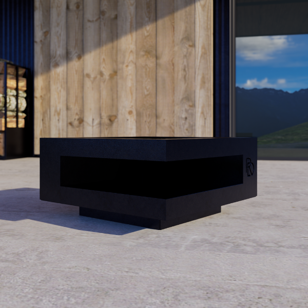 Cube Firepit – black outdoor firepit with wooden wall and mountain view in the background