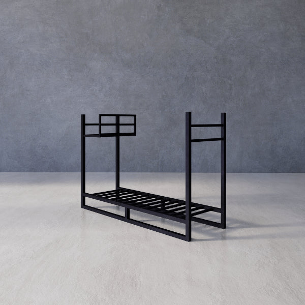 Firewood Rack Haven – black metal firewood rack against a gray wall