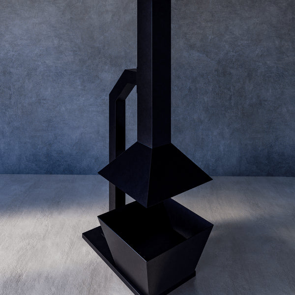 Floating Chimney – black metal chimney against a textured blue wall