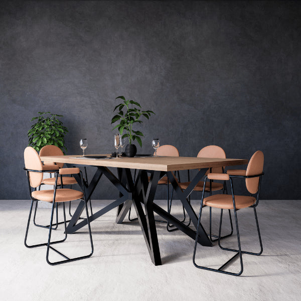 Iris dining table with six chairs against a dark gray wall