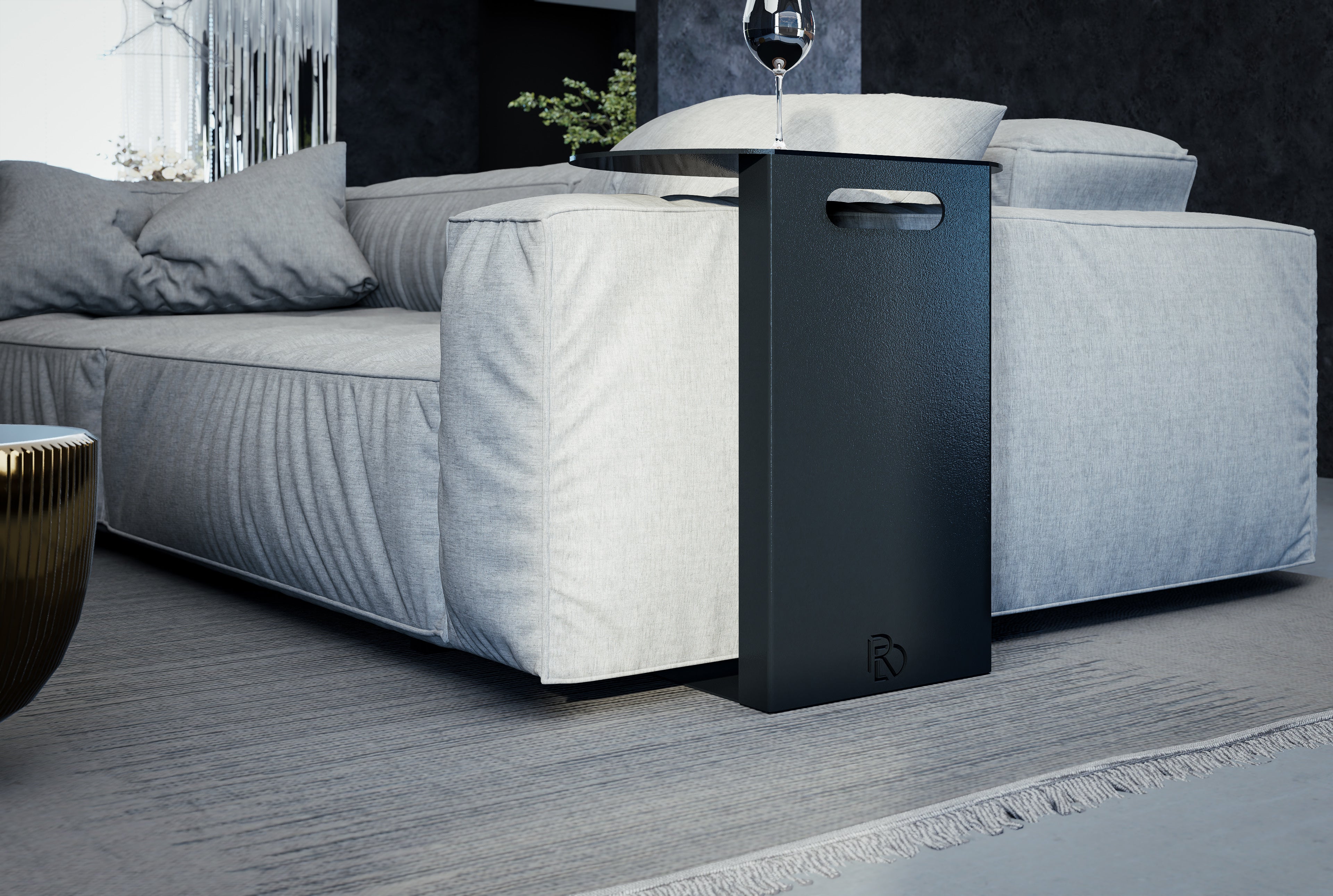 Luna Side Table — Modern living room with a gray sofa, black side table, and decorative elements.