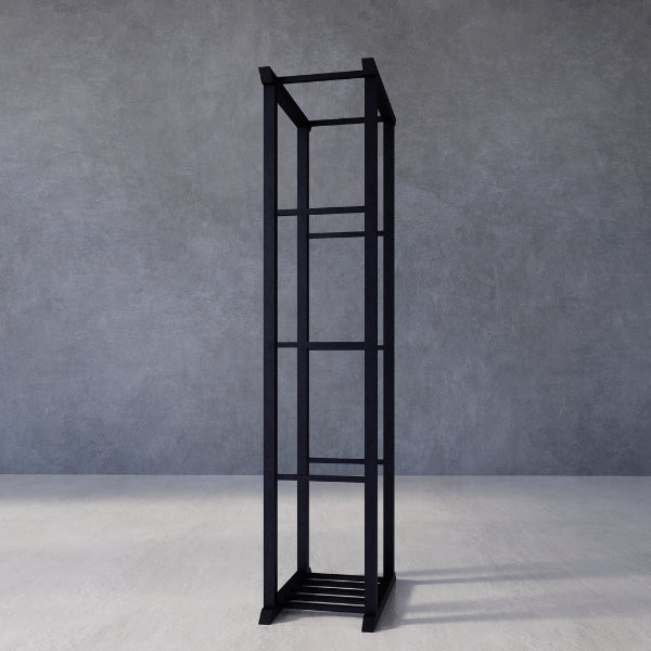 Secure Stacker Indoor Firewood Rack – black metal shelf against a gray wall