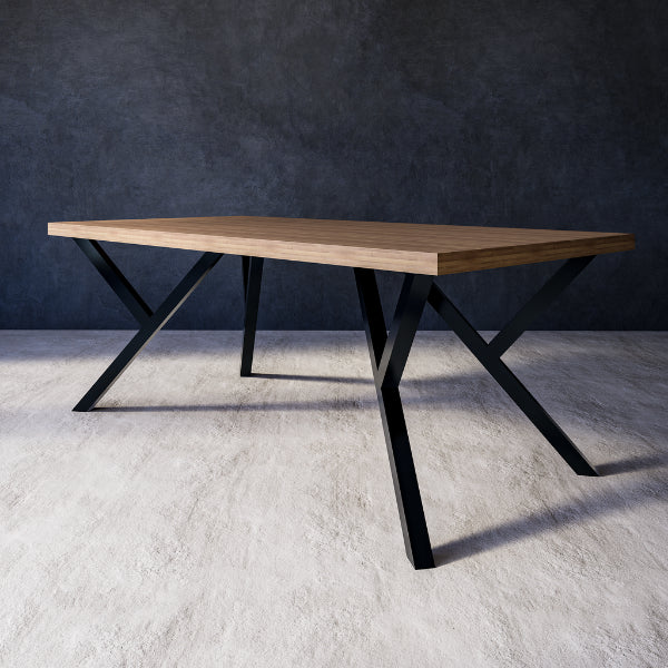 Serene dining table with wooden top and black metal legs on a gray floor with a dark wall background